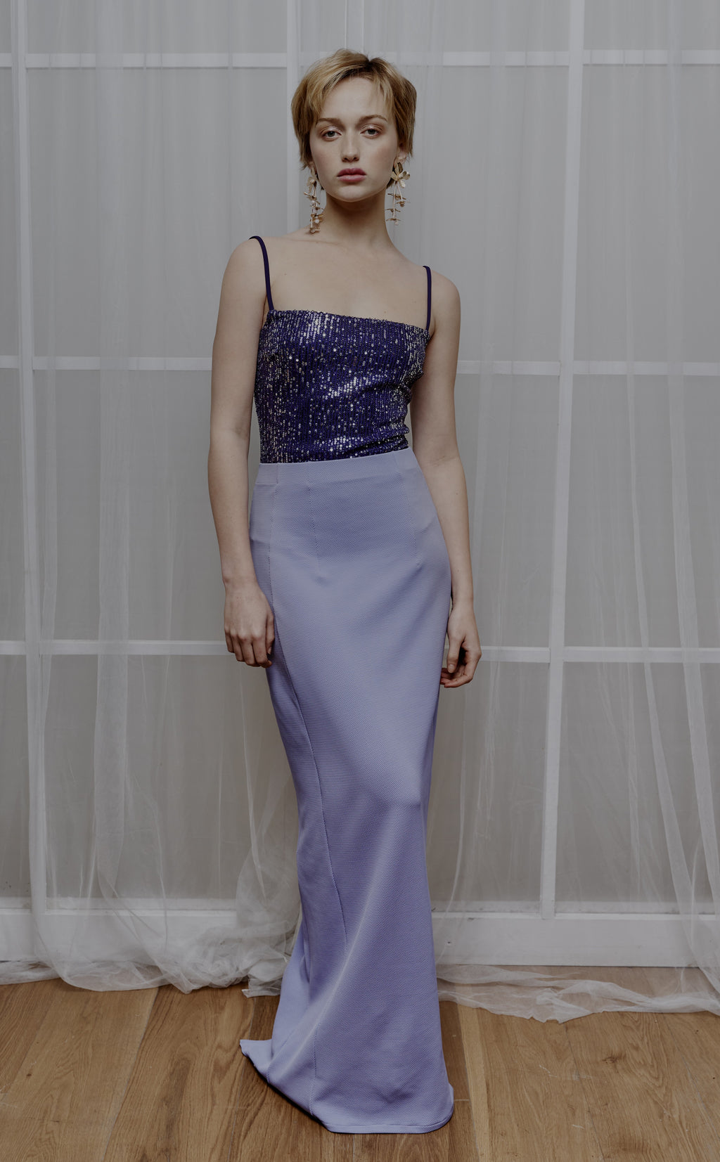Long skirt with slit and detailed stitching